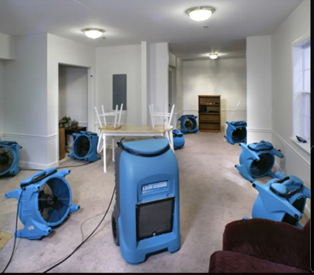 Air movers and dehumidifier setup for Water Damage Restoration in Northgate